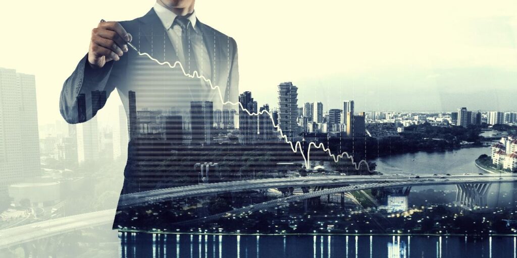 街とグラフを書く男性