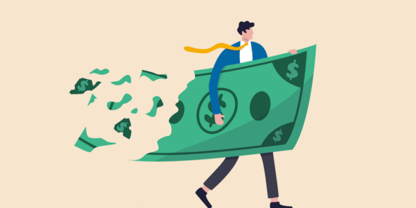 投資の失敗で紙幣を失う男性